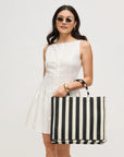 Iona Tote Bag held on model's arm