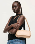 Max Shoulder Bag on model's shoulder
