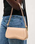 Max Shoulder Bag close up on model's arm
