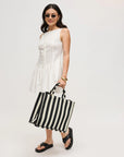 Iona Tote Bag held at model's side