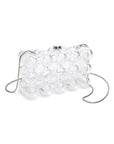 Clear plastic handbag with floral design on a white background, front/side