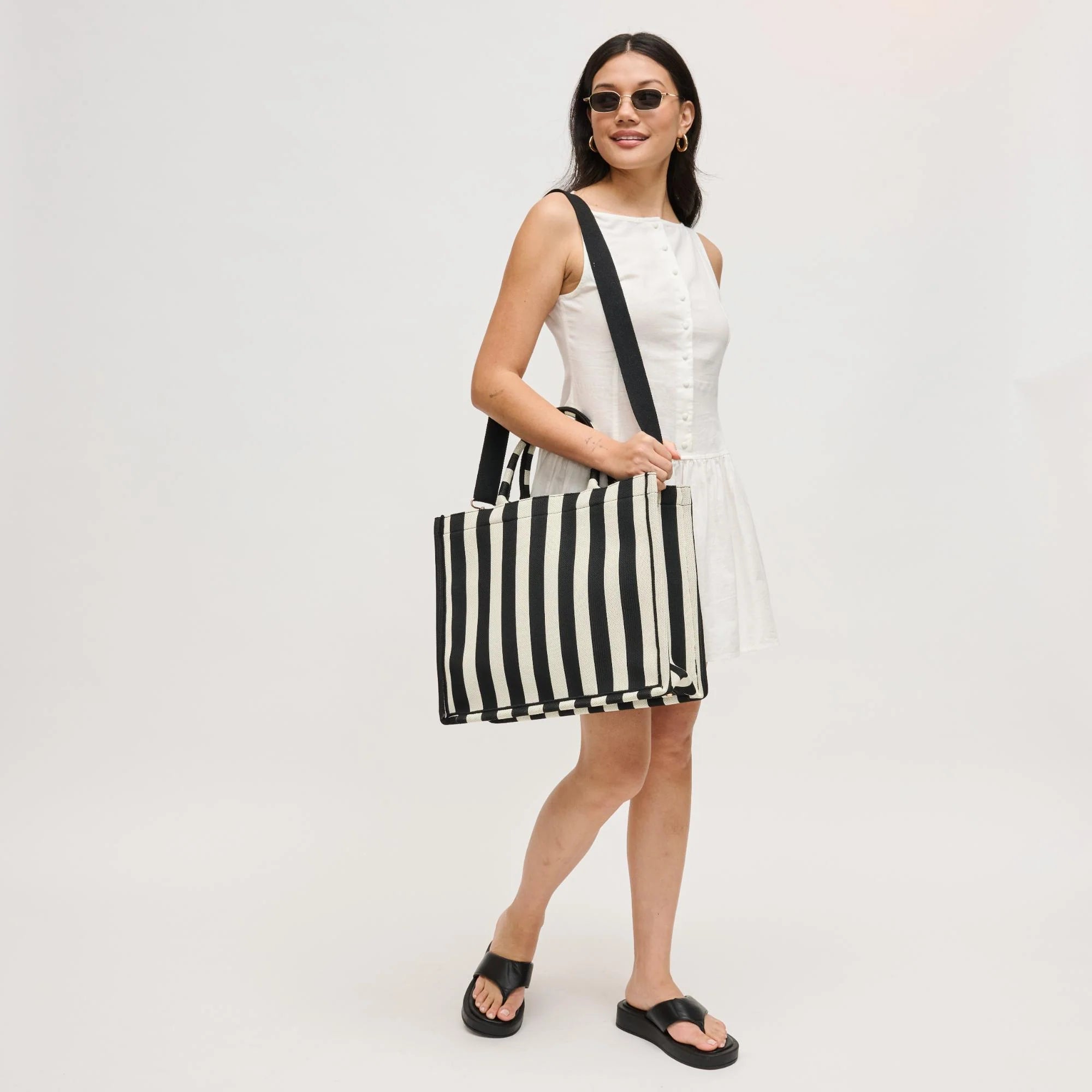 Iona Tote Bag on model's shoulder with canvas strap