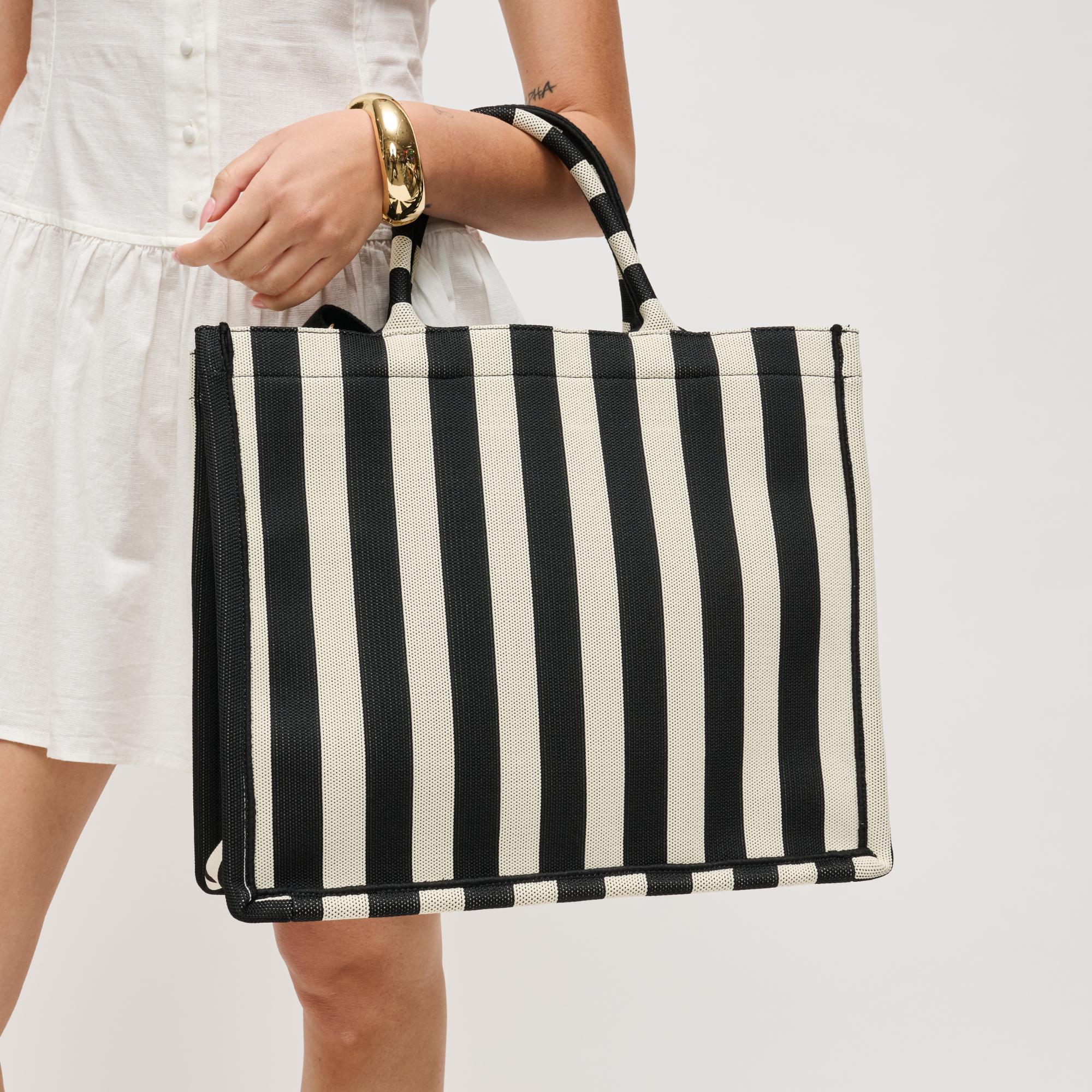 Iona Tote Bag close up on model's arm