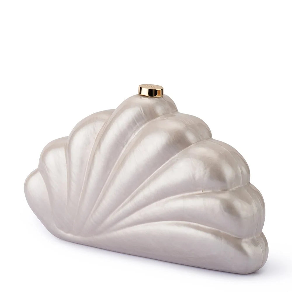 A shell-shaped evening clutch bag with a pearlescent silver finish and a small gold clasp at the top, shown on a plain white background.