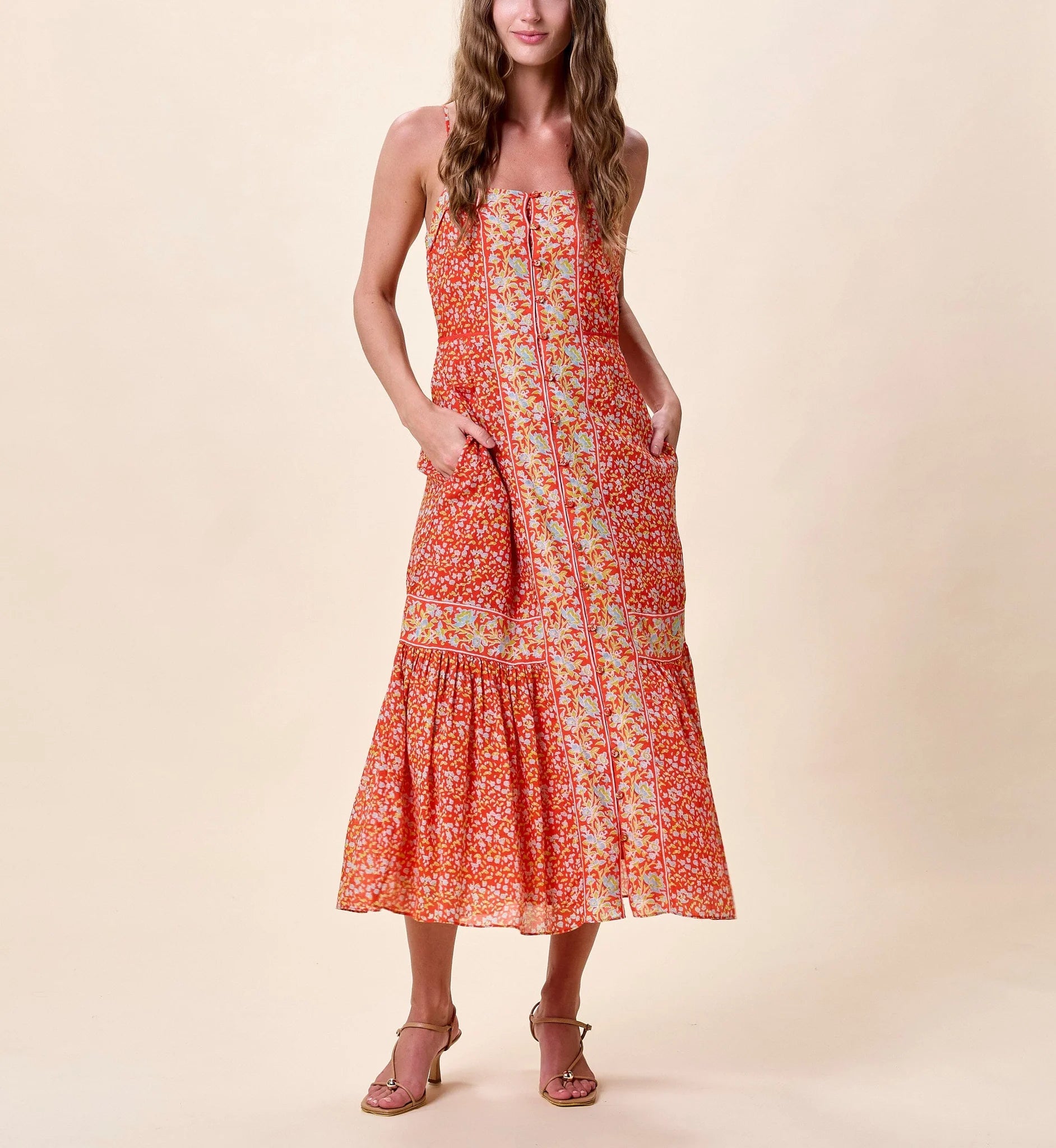 Miralani Midi Dress front view, hands in pockets