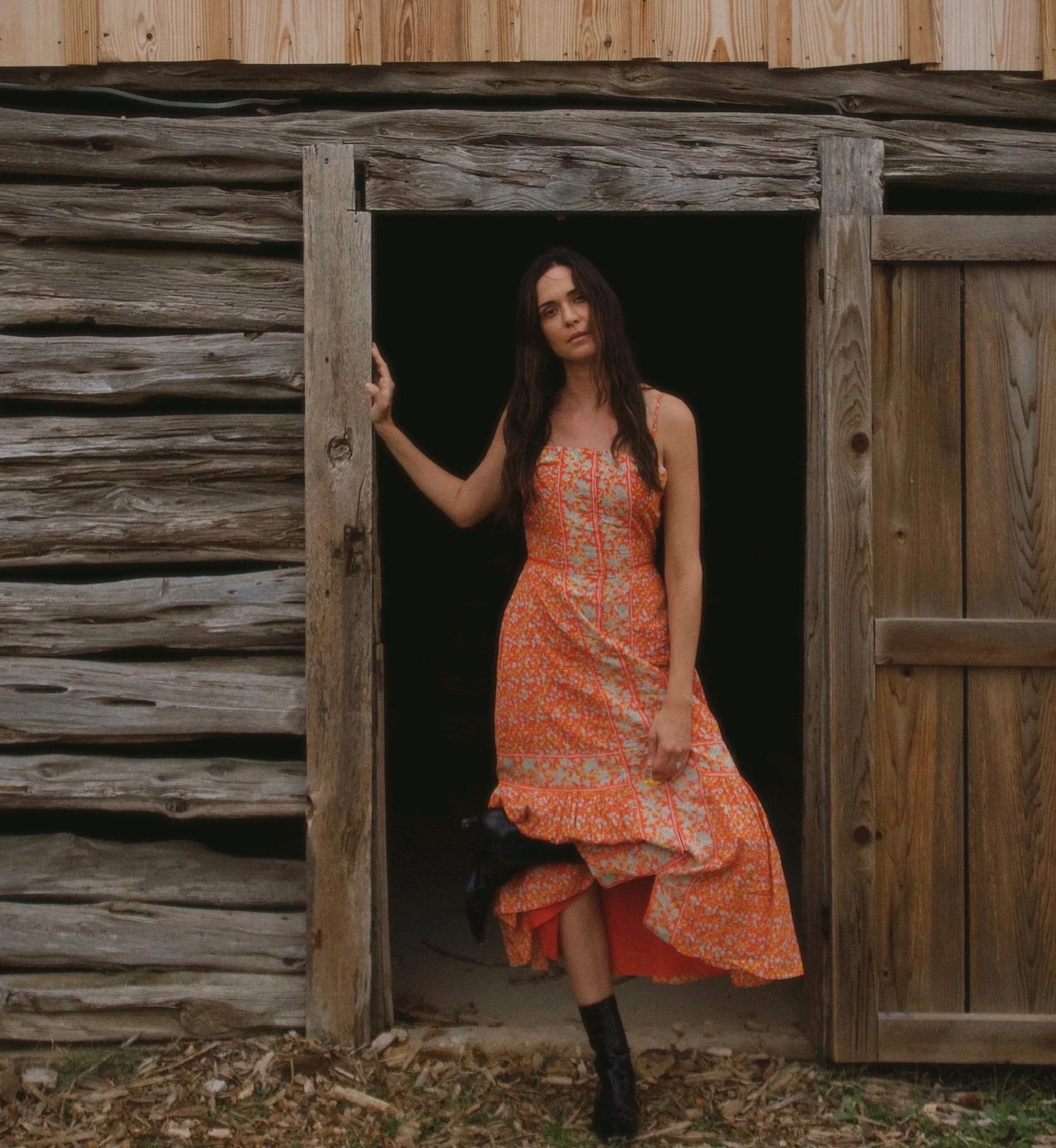 Miralani Midi Dress on model with barn background