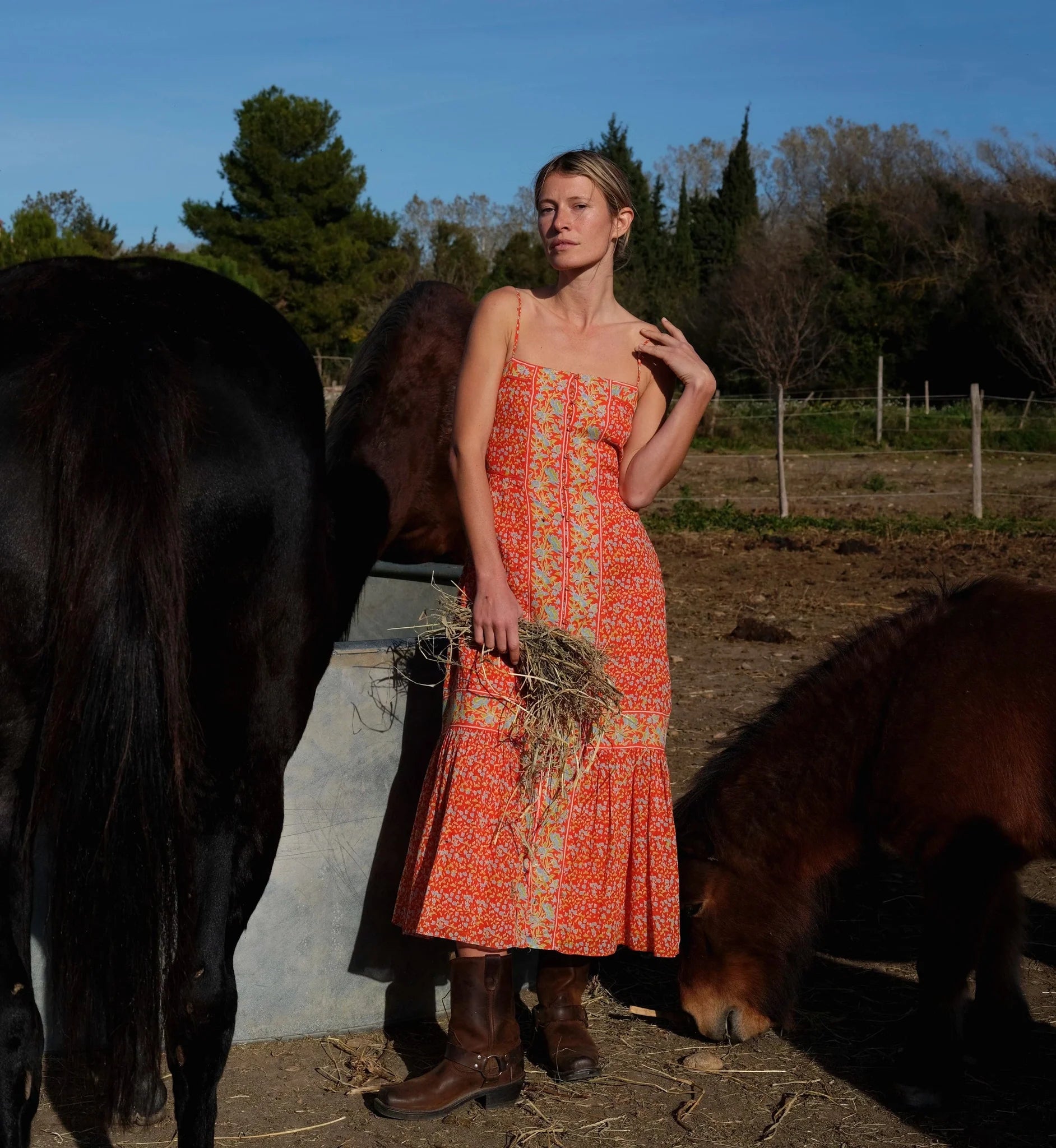 Miralani Midi Dress on model with farm background