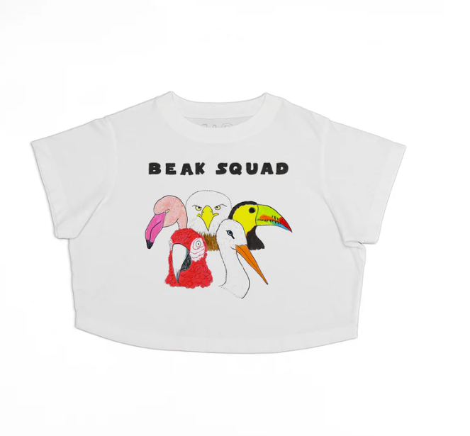 White crop top with colorful bird graphic and 'BEAK SQUAD' text on a white background
