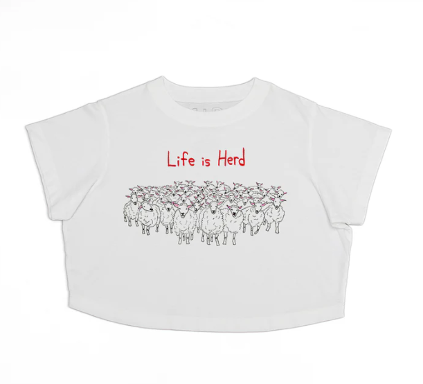 White crop top with red text 'Life is Herd' and sheep illustration on a white background