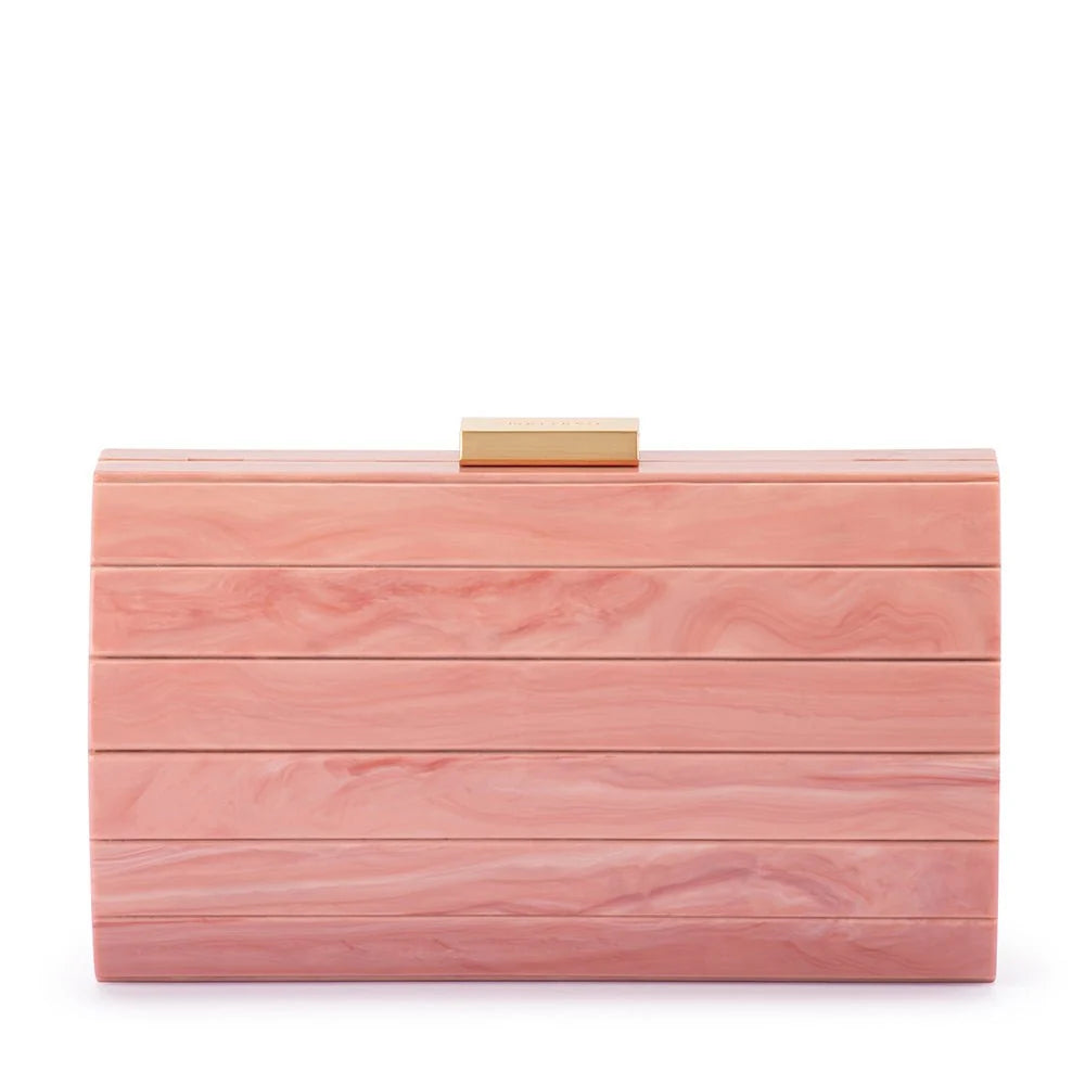 A rectangular evening clutch bag made of horizontal pink wood-grain planks, featuring a small gold metal handle on top, set against a plain white background.