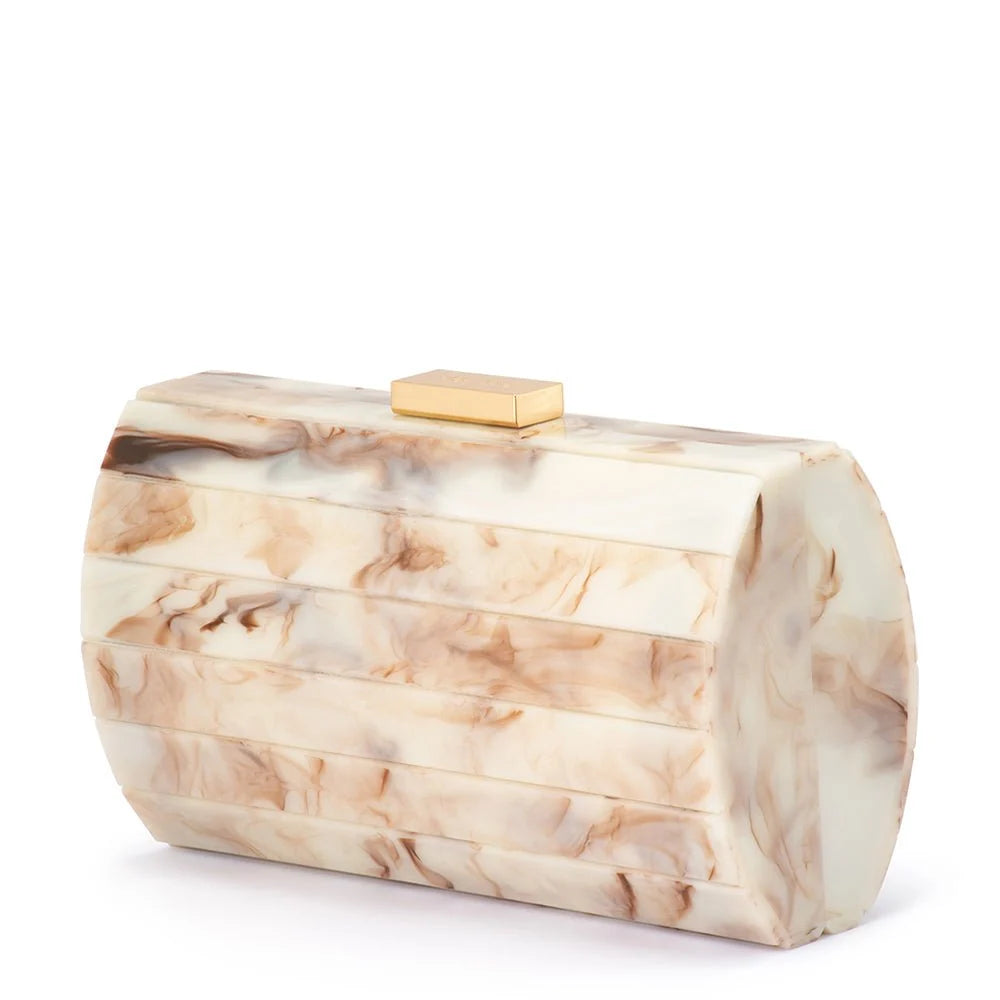 A rectangular clutch bag with a curved top and a gold-tone clasp, featuring a pleated design and a cream and beige marble pattern with brown veining, set against a plain white background.