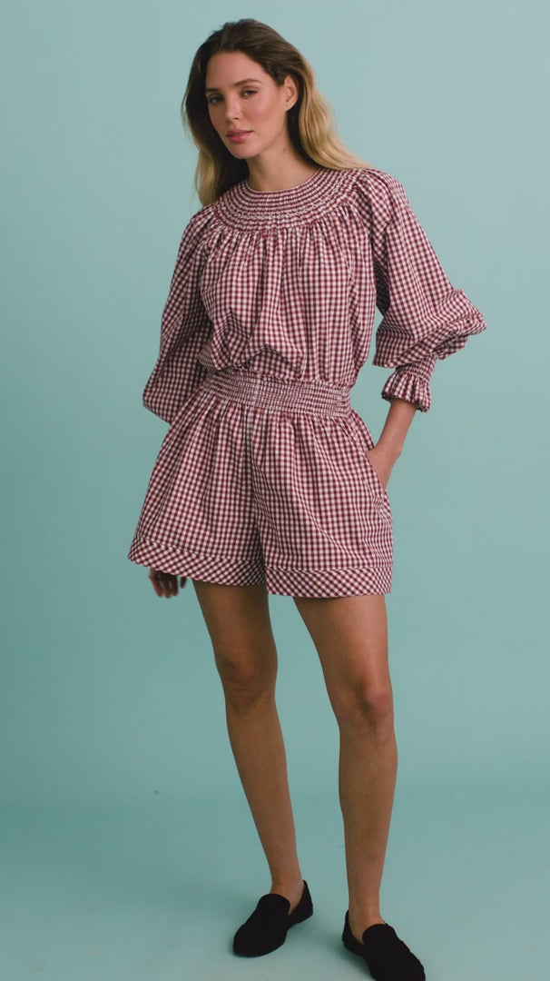 video of a model wearing a matching gingham set