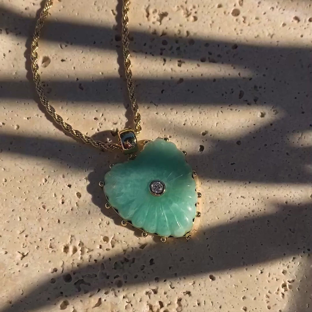 video of a heart charm necklace
