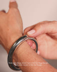 video of model showing how to take bangle bracelet on and off