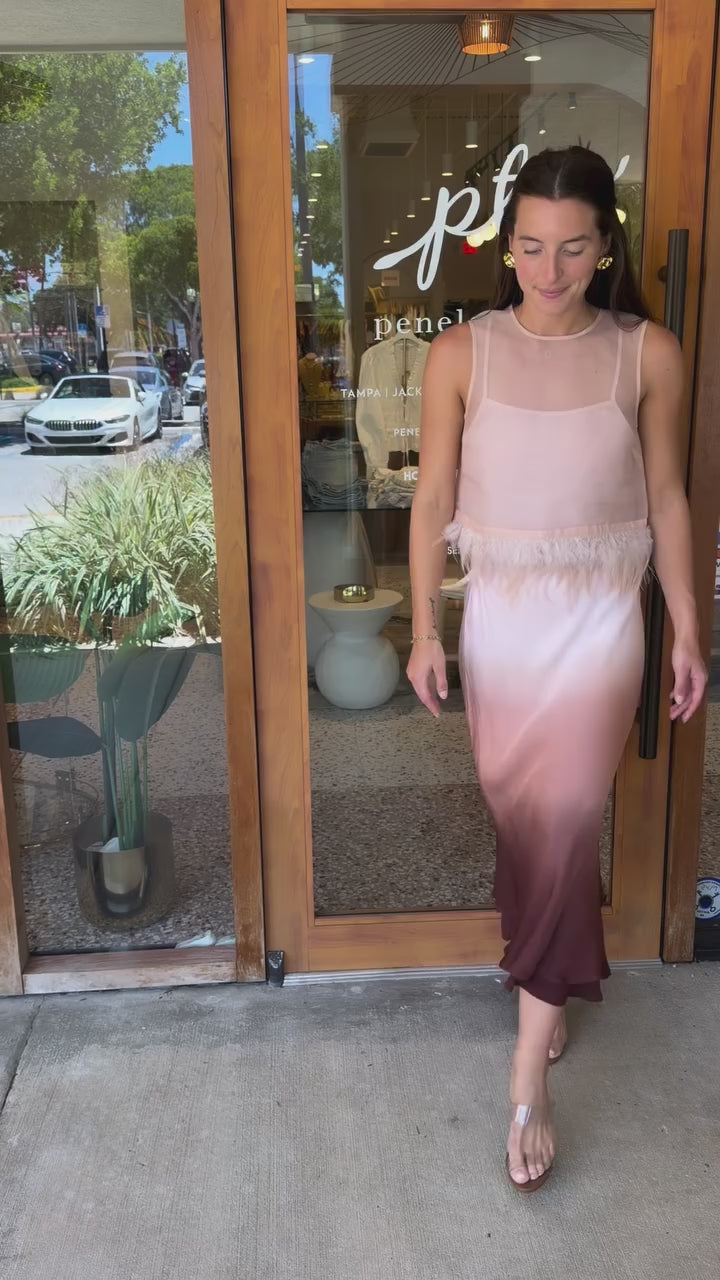 Woman modeling the Avi Feather Trim Silk Top and Perrin Midi Skirt
