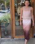 Woman modeling the Avi Feather Trim Silk Top and Perrin Midi Skirt