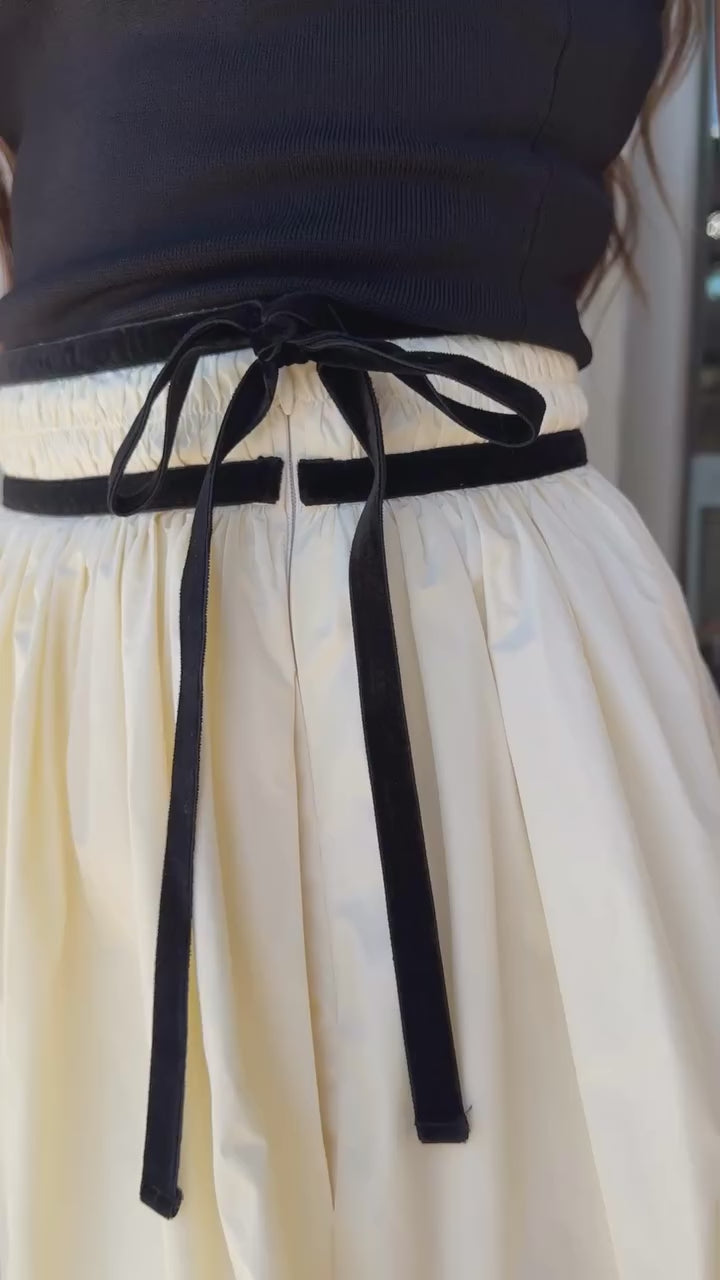 Angelina Skirt with black tank, calf hair boots and burgundy bag video