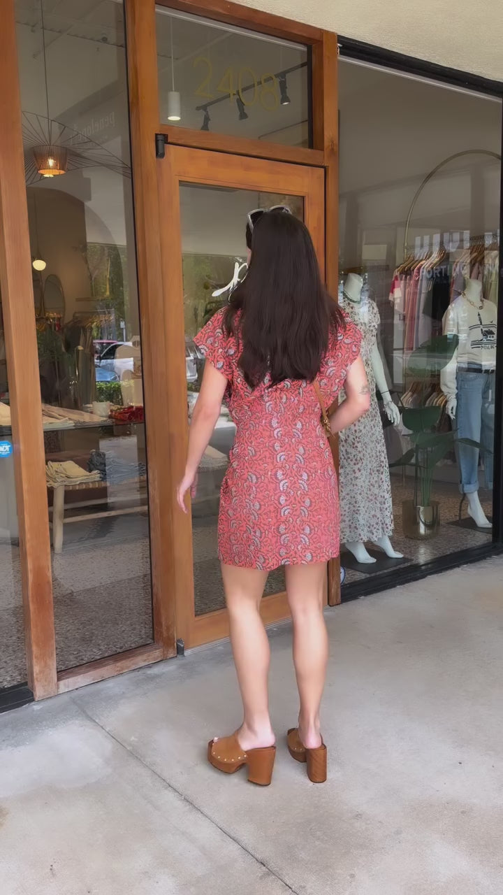 patterned mini dress and sol sandals