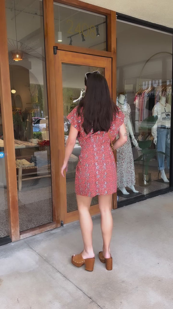 patterned mini dress and sol sandals