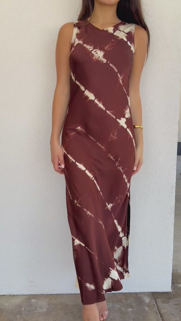 woman wearing burgundy dress