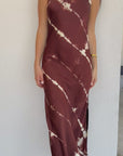 woman wearing burgundy dress