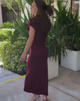 Woman modeling the Wilma Skirt and Mabel Wool Sweater