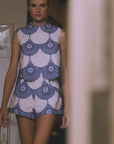 video of a model wearing a matching short and top set 
