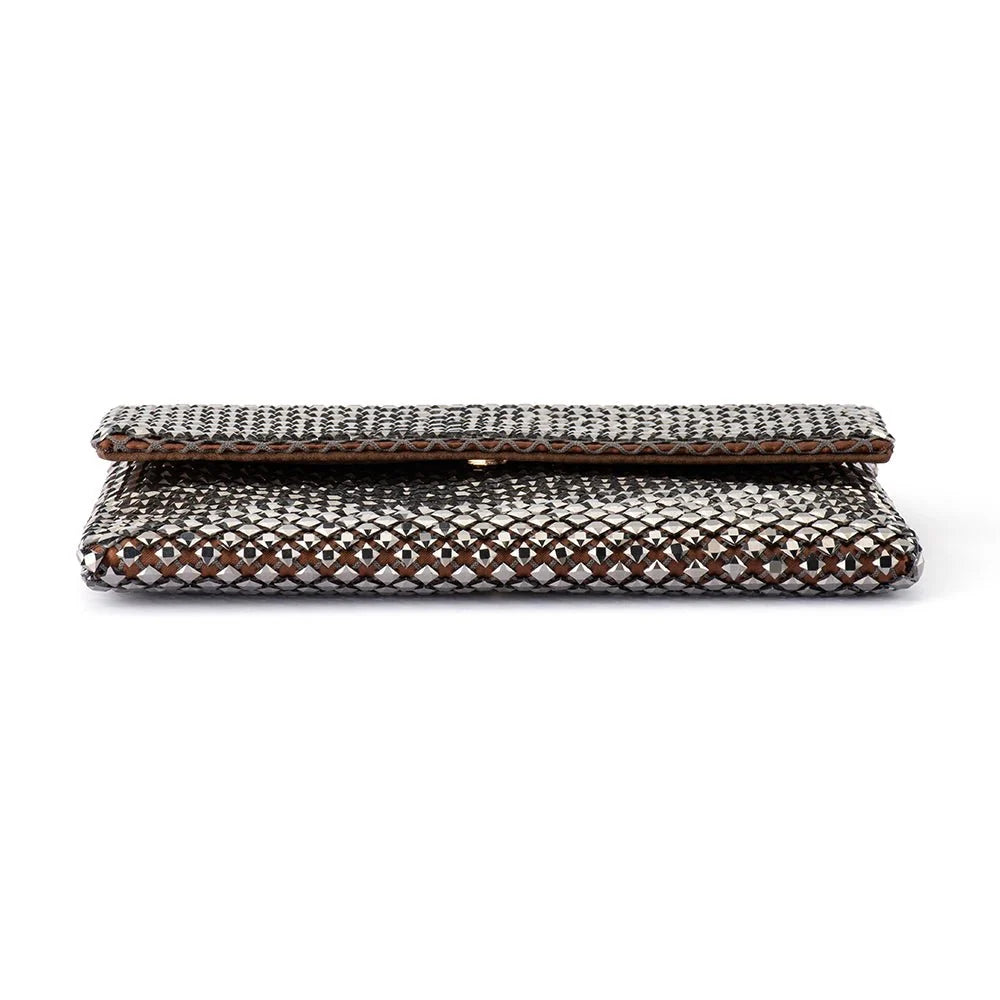 A rectangular clutch purse with an intricate metallic woven pattern, shown folded on a plain white background.