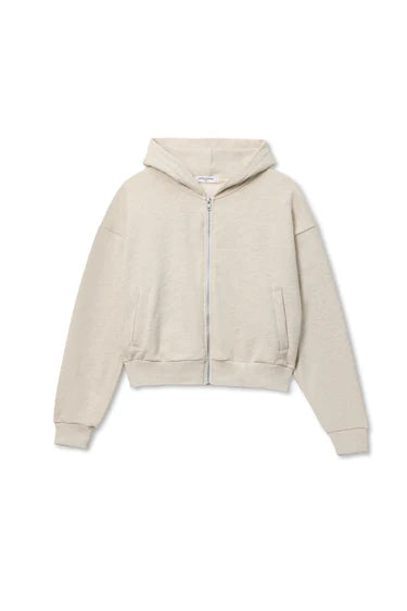 photo of a zip up hoodie in the color oatmeal on a white background