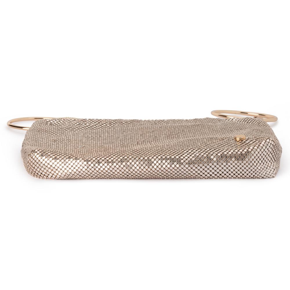 Gold mesh clutch bag on a white background