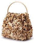 A gold-toned sequined handbag with a single round metal top handle and a small chain detail, photographed on a clean white background.