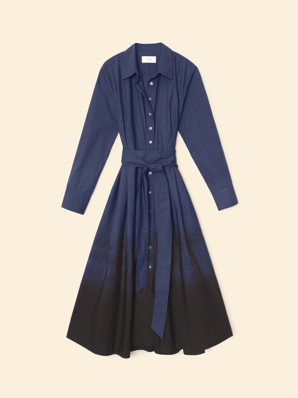 tessa dip dye navy to black long sleeve dress on a cream background 