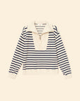 Navy and white striped shirt on a beige background