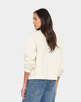 Lanna Cardigan back view on model