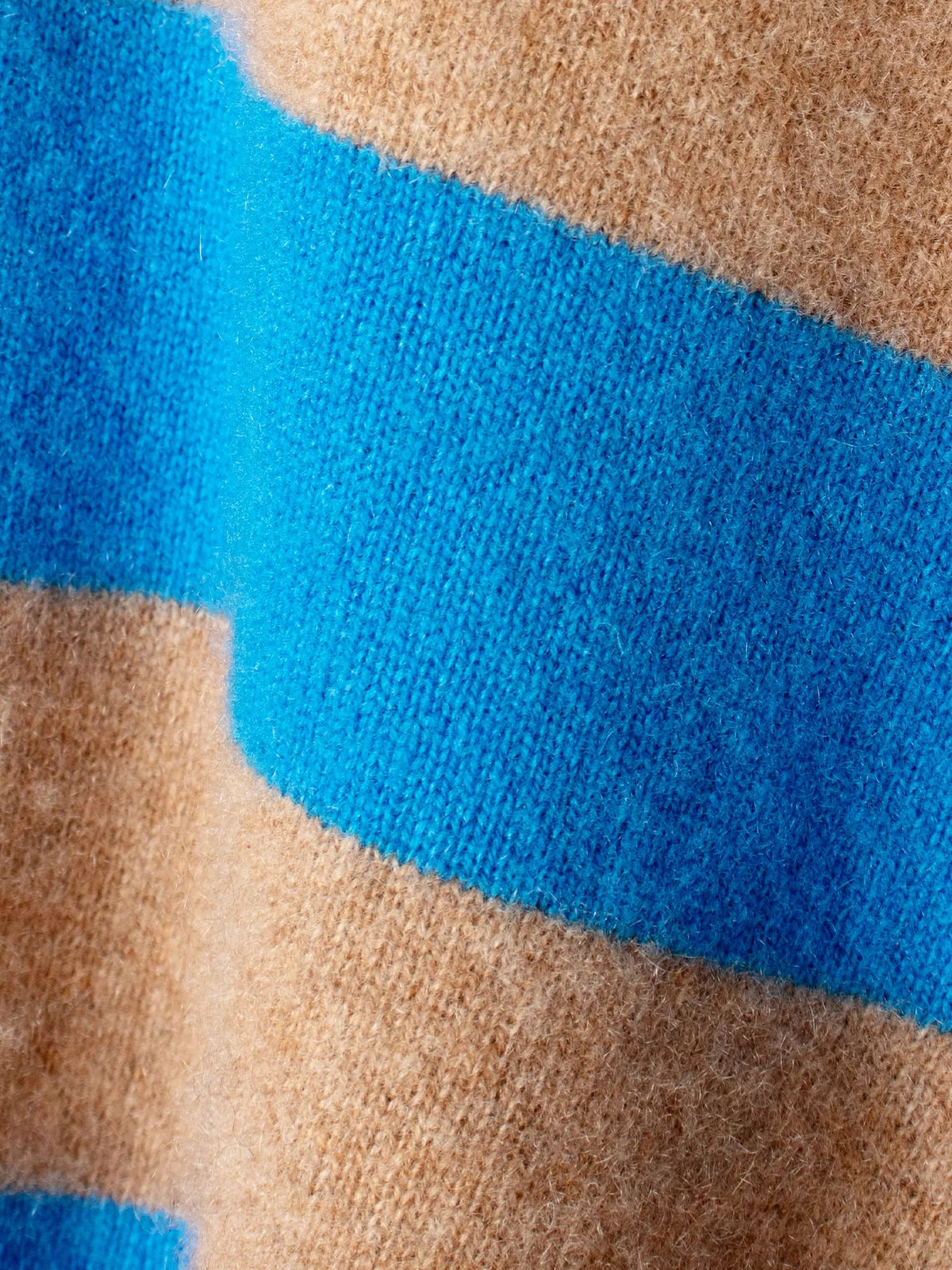 close up of a tan and blue stripe 