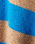close up of a tan and blue stripe 